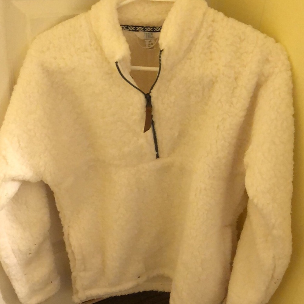 A fluffy cream pullover